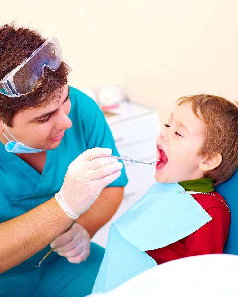 little boy at the dentist