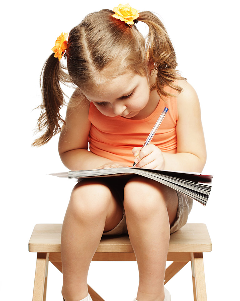 little girl taking a test